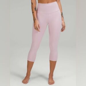 31 -Lululemon Align High-Rise Crop 21"
Pink Peony (pink not confirmed) -size 6